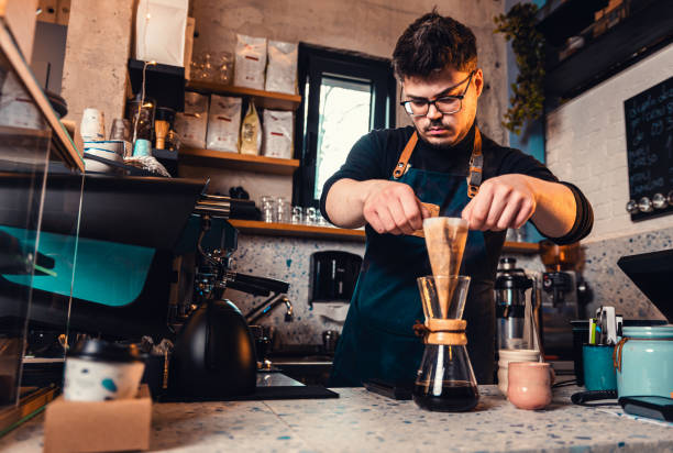 istock Barista preparing filter coffee in a modern coffee shop. 2162221078