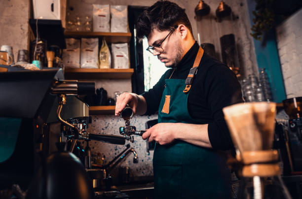 istock Barista preparing filter coffee in a modern coffee shop. 2162221083