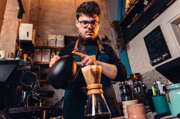 istock Barista preparing filter coffee in a modern coffee shop. 2162221087