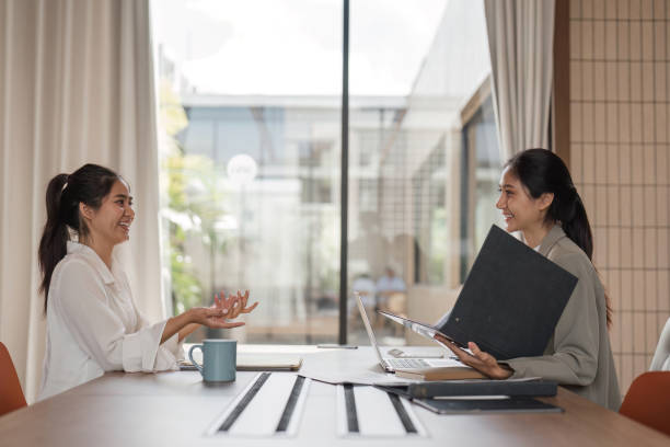 istock Business Team Engaged in a Productive Discussion and Consultation in a Modern Office Setting 2162221777