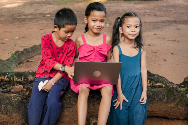 istock Cambodian children using digital tablet in village, Cambodia 2162222709