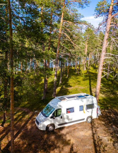 istock Camper Van in the Finnish Lapland Forest 2162225780