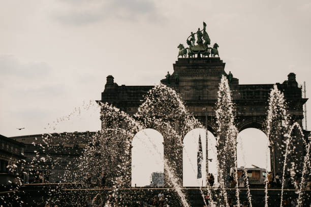 Low angle shot of triumphal Arch and fountain  in Brussels
