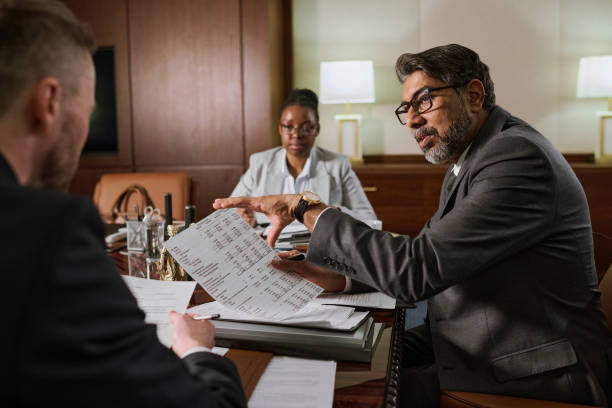 istock Discussion of paper document at meeting 2162228931