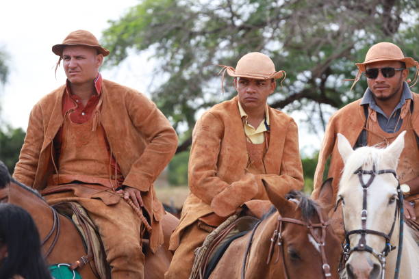 curaca, bahia, brazil - july 7, 2024: Northeastern cowboy takes part in the mass in honor of his profession in the city of Curaca.