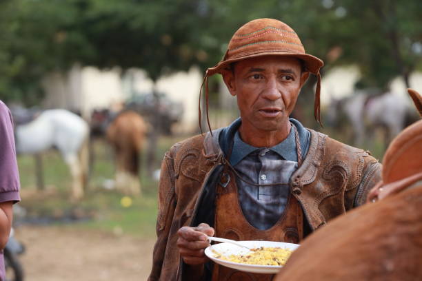 curaca, bahia, brazil - july 7, 2024: Northeastern cowboy takes part in the mass in honor of his profession in the city of Curaca.