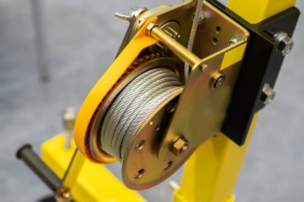 istock Yellow drum winch. Hand winch. Device for moving load. Rope lever. Power machinery 2162235222