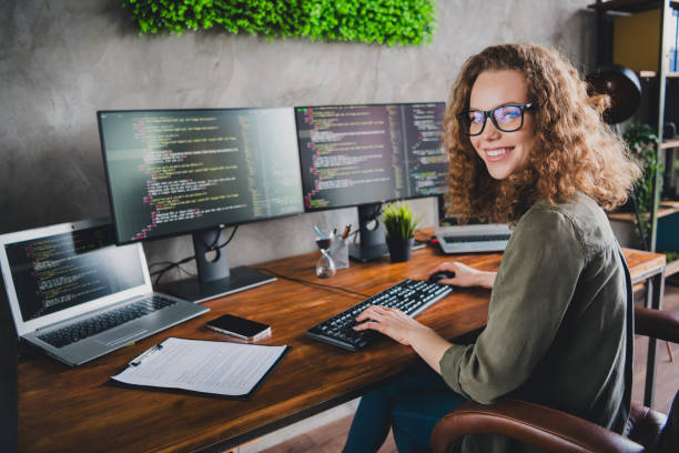 istock Photo of lovely successful woman software developer sitting armchair comfortable workspace workstation indoors 2162237901
