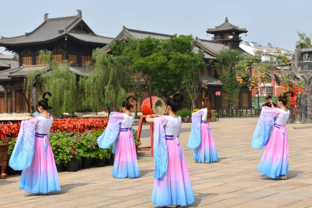 Chinese New Year, Chinese girl wearing ethnic minority costumes in an ancient village