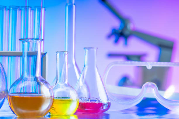 istock Dishes for chemical experiments. Laboratory. Metal table with flasks. Flasks with chemical liquids. Scientific research. Education. 2162241947