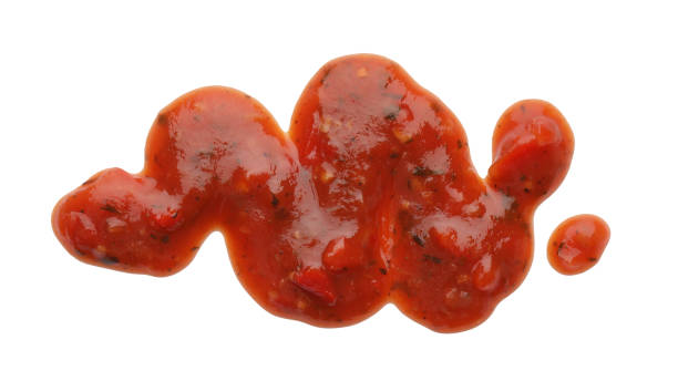 istock Tomato sauce isolated on white, top view 2162243119