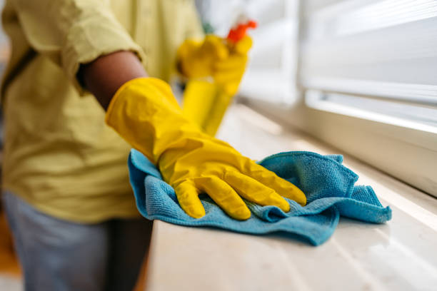 istock Young Man Cleaning His Window Sill At Home 2162243635