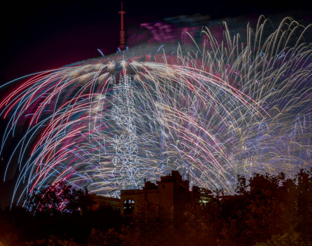Paris, France - 07 14 2024: July 14 fireworks fired from The Eiffel Tower in Paris