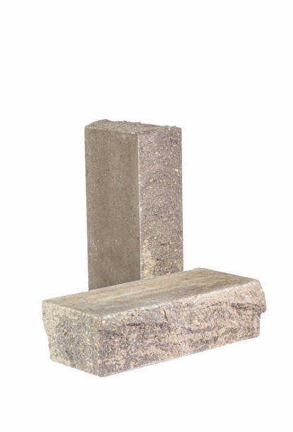 istock Materials Ideas. Pair of Solid Artificially Aged Dark White Bricks for Building Construction Works Isolated on White 2162253018