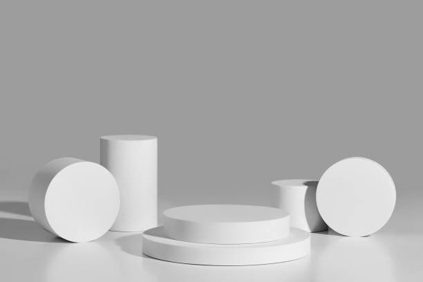 istock Abstract showcase mockup of two-level round platform and cylinders on gray background 2162253625