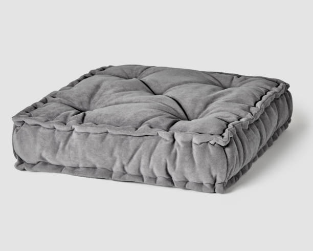 istock Soft comfortable gray fabric floor cushion for apartment interior 2162254117
