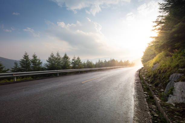 istock The mountain road at dusk 2162254740