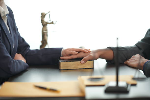 istock Experienced lawyers provide advice to clients. Assist in difficult litigation Explain the legal process and discuss the terms of the agreement legal services Close-up pictures 2162259945