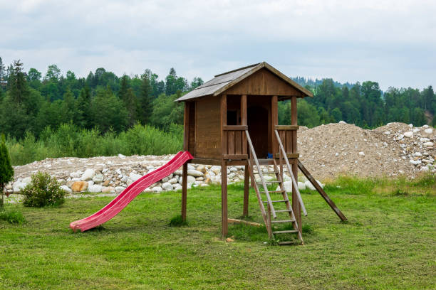 istock a house on a childrens playground 2162270254