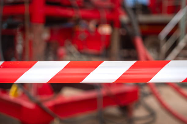 istock Caution barricade tape stiped at industrial work area. 2162273109