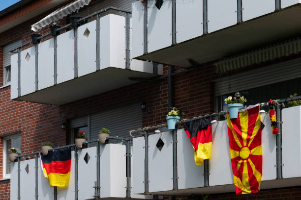istock Germany and Macedonian flags exposed on the balcony. 2162274181