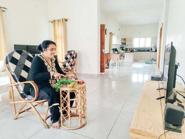 istock Indian woman preparing food 2162275605