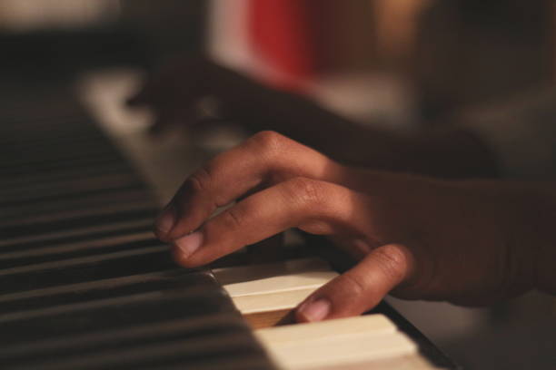 istock Creative Hands on Old Honky Tonk Piano: Wide Aperture Shot 2162278955
