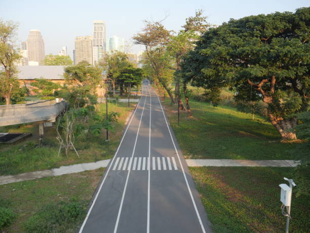 istock Jogging and walking tracks in park 2162280420