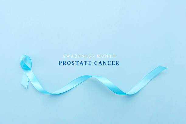 istock blue large ribbon with text prostate cancer awareness on blue background 2162281773