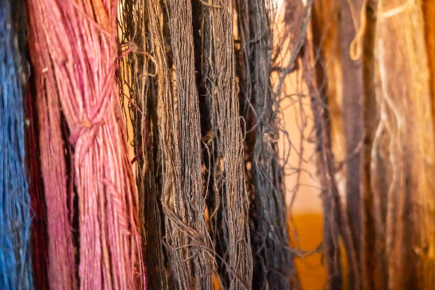 View on silk, colored with natural colors, used for weaving on loom in workshop in Ambalavao, which is famous for it's thick silk material. Madagascar