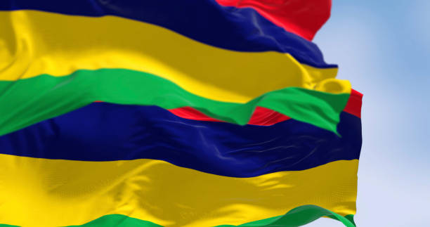 istock Two Mauritius national flags waving on a clear day 2162287533