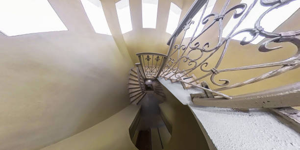 Close up shot of a stone spiral staircase in a French building, selective focus