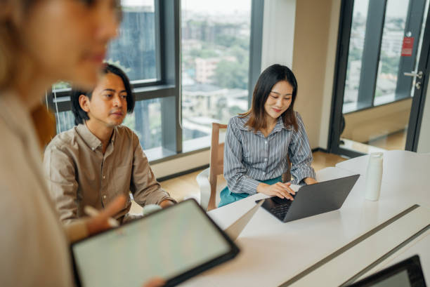 istock Group of multi-ethnic business people working together 2162290333
