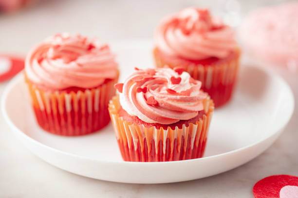 istock Red velvet cupcakes with whipped cream for Valentine's day 2162293364