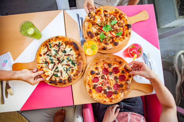 Lifestyle food with italian pizza naples hand tossed with fresh ingredients and cooler drinks.