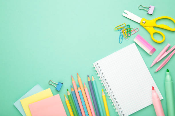 istock Studio shot of school supplies on mint background. Space for text 2162299220
