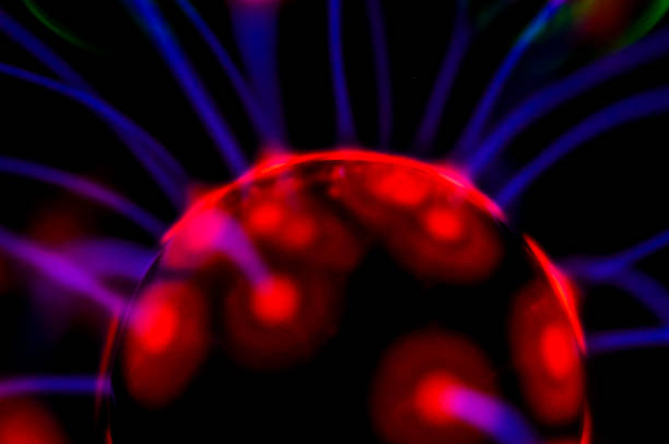 istock A red glowing ball with purple and blue streaks 2162302746