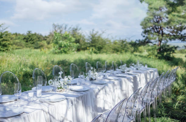 istock The festive table with a white tablecloth is decorated with flowers 2162312245