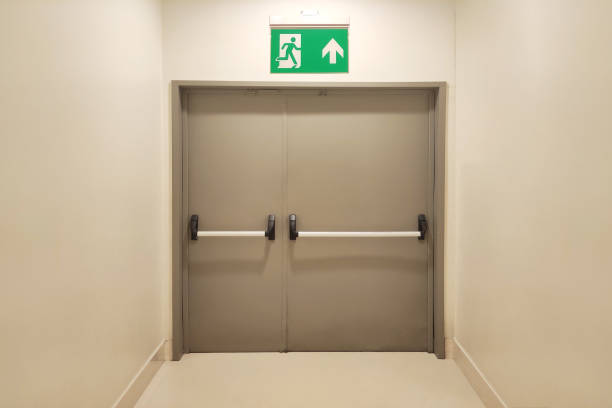Emergency exit door at the end of the corridor