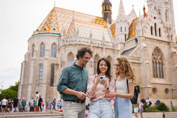 istock Group of friends enjoying a moment together while exploring the iconic architecture of Budapest's Fisherman's Bastion 2162313455