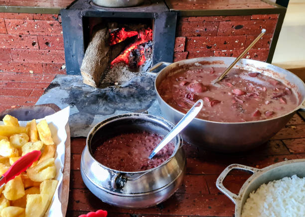 istock feijoada cooked in a wood stove with rice and farofa 2162319323