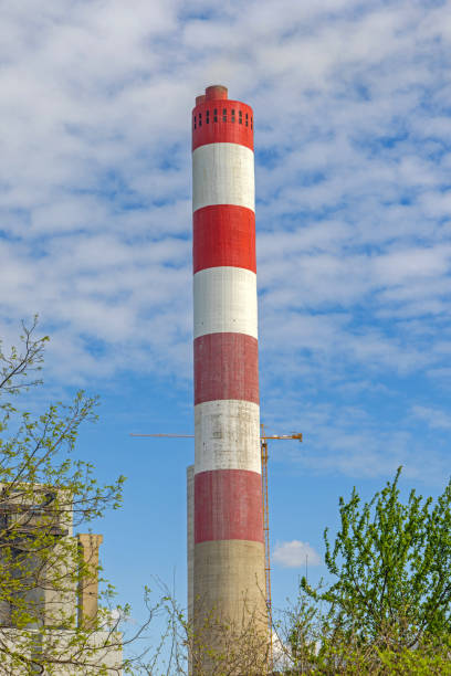 Red and White Tall Chimney at Thermal Power Plant Facility
