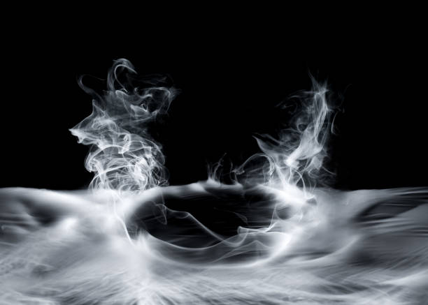 istock Real smoke exploding and swirling outwards. Dramatic smoke or fog effect for spooky Halloween or other dramatic background. 2162326409