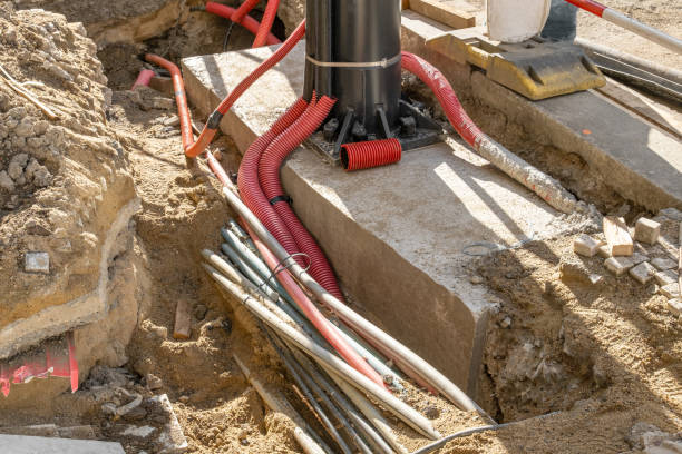 istock Electrical wires on a tramway pole, essential for powering the tram system electric and high-speed Internet Network cables are buried underground 2162327624