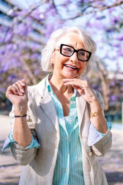 istock lively mature woman gesturing with hands 2162329000