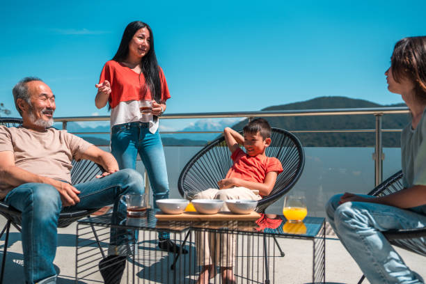 istock Asian Family's Relaxing Terrace Get-Together 2162330149