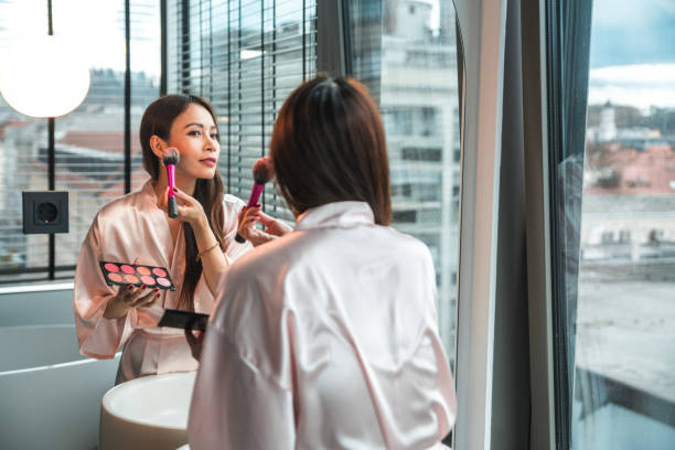 istock Beautiful Asian Female Getting Ready in Silk Bathrobe 2162330523