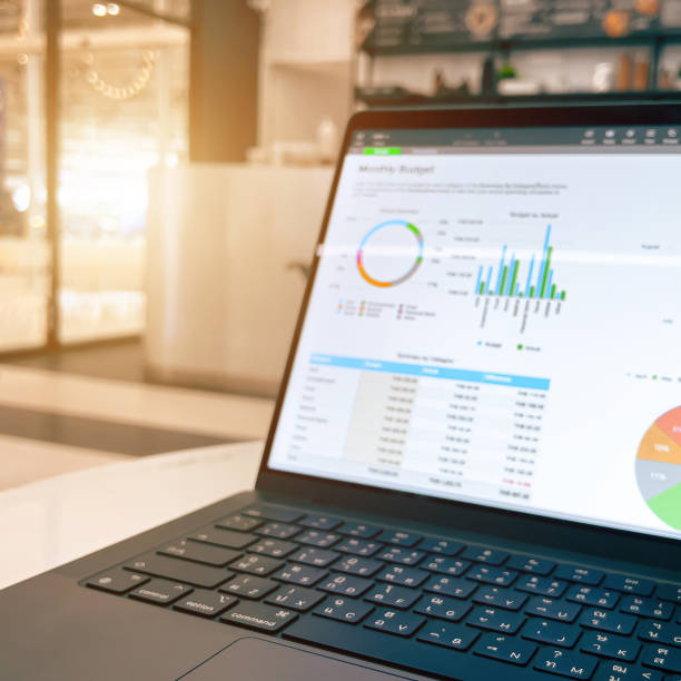 istock Monthly budget analysis graph on laptop at workplace. 2162332704
