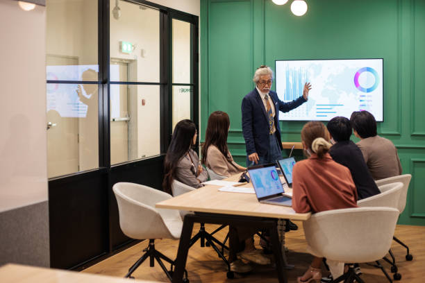 istock Coworkers Discussing Market Trends 2162338573