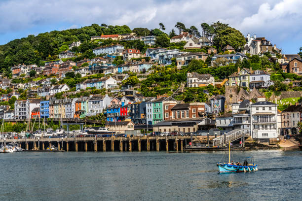 istock Colorful Small Blue Boat Dartmouth Kingswear Harbor Devon England 2162340941